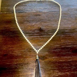 White House Black Market Long pearl necklace with tassels.